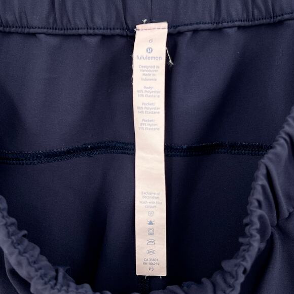 LULULEMON On The Fly Woven 27" Pants Womens 6 Dark Navy Cropped Slim Straight - Picture 13 of 14